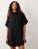 performance fabric relaxed short sleeve mini dress in black