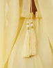 draped cape bodice maxi dress with skirt and open-back tassel detail in yellow