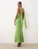 Tall bias cut plunge neck cami dress with full godets and scarf detail in green