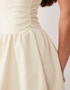 The Frolic exclusive slinky jersey ruched side detail flippy hem mini dress in yellow