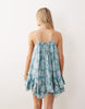 Iisla & Bird paisley print handkerchief hem mini dress in dusky blue