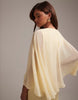 Bridesmaids sheer chiffon cape overlay bias cut satin dress in lemon