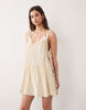 Daisy pleated lace beach sundress in buttermilk