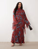 Curve draped raw edge ruffle trim long sleeve maxi dress in floral print