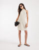 Vero Moda Tall halter neck polka dot mini dress in cream and black
