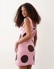knit mini dress in pink polka dot print