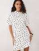 wrapped waist mini dress with lace hem in mono polka dot