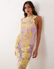 embroidered and embellished lace dress with open back and cut outs in lilac