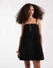 denim cami mini dress with button detailing in clean black