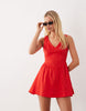 waisted v-neck mini sundress with seaming details in vibrant red