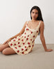 button crinkle mini dress in yellow & red floral print
