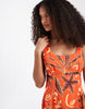 Vero Moda sleeveless pleated front mini dress in orange sea shell print