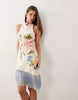 embroidered mini dress with fringe hem in pale pink