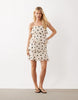JDY mini cami dress with ruffle layers in cream polka dot print