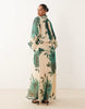 Curve high neck draped chiffon maxi dress with neck tie in green floral print