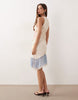 embroidered mini dress with fringe hem in pale pink