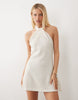 halter neck mini dress in cream