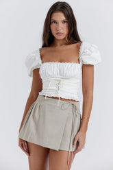 stone pleated wrap mini skirt