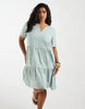 ONLY Curve tiered mini dress in green floral print