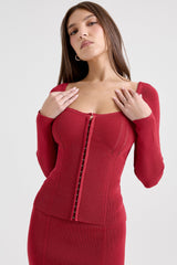 red fitted long sleeve top