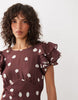 Nobody's Child Lola v neck back detail flutter sleeve midi dress in brown polka dot print