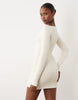 Oh Polly modal boat neck long sleeve draped waist detail mini in ivory