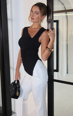 Sullivan Top - Sleeveless Asymmetrical Cut Out Top in Black