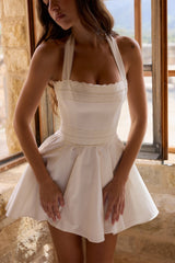 white broderie anglais + cotton halter neck mini dress