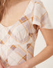 mini day dress with godet hem in brown plaid print