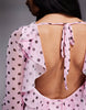 Kaiia exclusive slinky long sleeve ruffle hem open back mini dress in pink and black polka dots