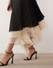 bias cut bodice and full hem skirted dress with double layer in black and cream