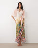 Hope & Ivy flutter sleeve wrap maxi dress in pink floral boarder scene
