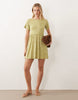 Wednesday's Girl smudged dots mini dress in green and white