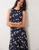 racer neck maxi dress with godets in navy polka dots