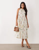 VILA halter neck tiered maxi dress in cream floral print