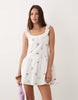 Esmée mini beach dress in white ditsy floral