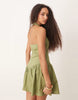 halter mini dress with ruffle hem in washed khaki