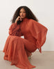 high neck maxi dress with godet hem in rust