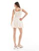 The Frolic exclusive poplin ruched bust dropped waist puffball mini dress in cream