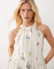 VILA halter neck tiered mini dress in cream floral print