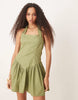 halter mini dress with ruffle hem in washed khaki