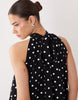bow detail mini dress in mono polka dot