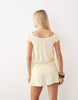 Motel Papino cut out off the shoulder mini dress in butter yellow