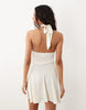 textured halter neck mini dress in ecru