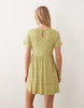 Wednesday's Girl smudged dots mini dress in green and white