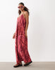 VILA cami maxi dress with crossed straps in red tropical print