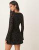 flocked floral mini dress with flute sleeve in black