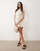 Esmee broderie halter mini dress in cream