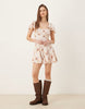 mini day dress with godet hem in brown plaid print