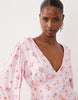 VILA v neck button front long sleeve mini dress in pink floral print